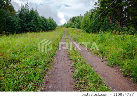 Rural road goes on toop of the Mount Tserkovka Rural road goes on toop of the Mount Tserkovka 110954787