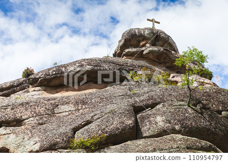 Rock with golden cross of the top. Mount Tserkovka on a sunny day Rock with golden cross of the top. Mount Tserkovka on a sunny day 110954797