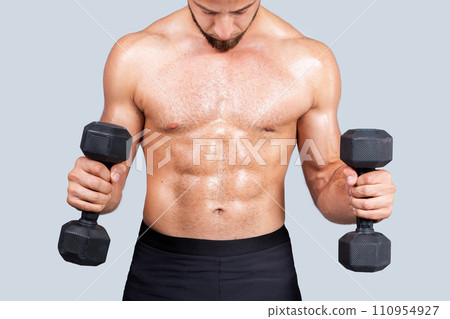 Serious sweat strong muscular young european guy athlete with beard 110954927