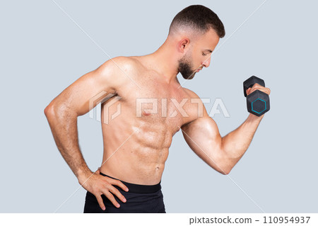 Concentrated calm sweat handsome strong muscular millennial caucasian guy with beard, naked torso make exercises Concentrated calm sweat handsome strong muscular millennial caucasian guy with beard, naked torso make exercises 110954937