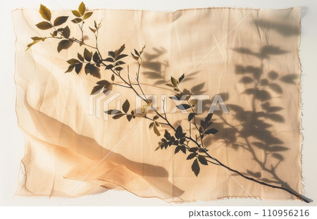 shadow of plant on a flat piece of fabric shadow of plant on a flat piece of fabric 110956216