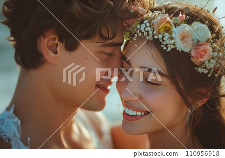 a couple and flowers crowns smiling together 110956918