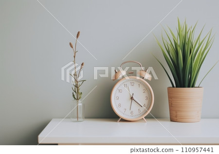 a white table with a clock and plants on it a white table with a clock and plants on it 110957441