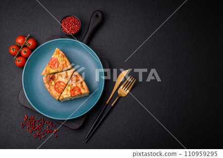 Delicious quiche with tomato, cheese, chicken, spices and herbs Delicious quiche with tomato, cheese, chicken, spices and herbs 110959295