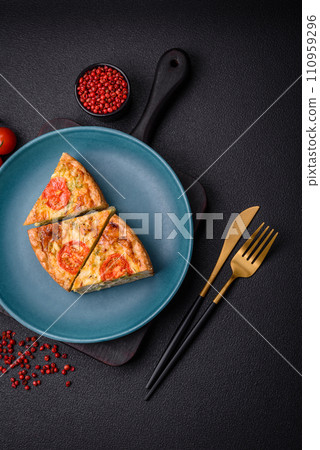 Delicious quiche with tomato, cheese, chicken, spices and herbs Delicious quiche with tomato, cheese, chicken, spices and herbs 110959296