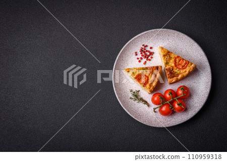 Delicious quiche with tomato, cheese, chicken, spices and herbs Delicious quiche with tomato, cheese, chicken, spices and herbs 110959318