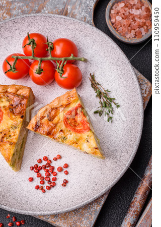 Delicious quiche with tomato, cheese, chicken, spices and herbs Delicious quiche with tomato, cheese, chicken, spices and herbs 110959450