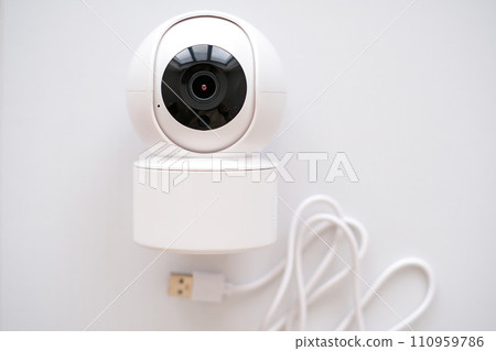 A white camera on white background 110959786
