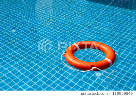 A view from above of the pool in which the life preserver is thrown A view from above of the pool in which the life preserver is thrown 110959846