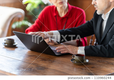 Senior businessmen using computers 110960244