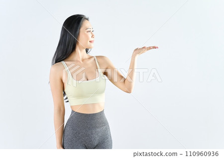 A woman wearing sportswear making recommendations A woman wearing sportswear making recommendations 110960936