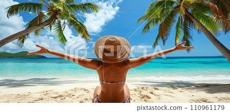 Happy woman enjoying a relaxing summer beach vacation with palm trees and sea beach Happy woman enjoying a relaxing summer beach vacation with palm trees and sea beach 110961179