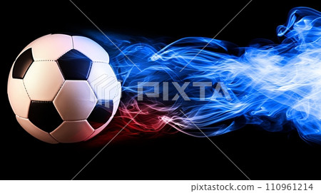 Energetic soccer ball with vivid, multicolored smoke dispersing against black backdrop 110961214