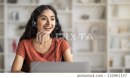 Young Indian Woman In Headset Watching Webinar On Laptop 110961337
