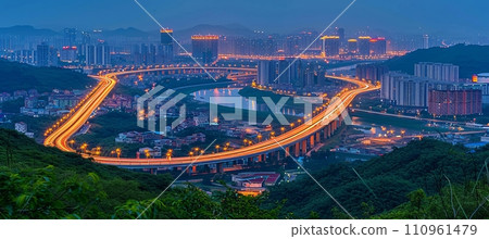 Bird s eye view of bustling expressway traffic, a crucial infrastructure in the megalopolis 110961479
