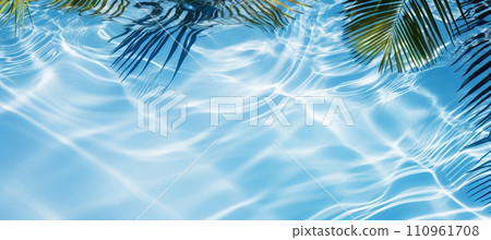Tropical leaf shadow on water surface, white sand beach background for summer vacation 110961708