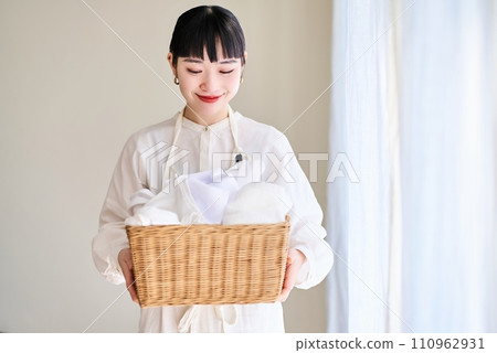young woman with laundry 110962931