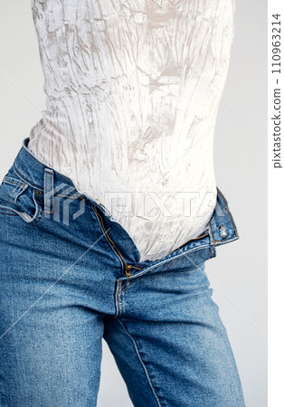 Woman with jeans. Anonymus lady dressing up. 110963214