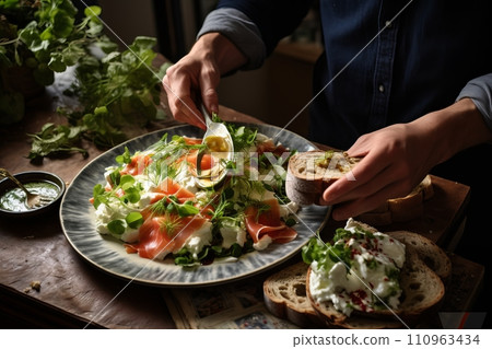 Food stylist decorating meal in restaurant, close up of waiter carrying bright dish on white plate Food stylist decorating meal in restaurant, close up of waiter carrying bright dish on white plate 110963434