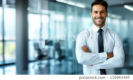 Happy businessman at office meeting, portrait with copy space on blurred glass walls background Happy businessman at office meeting, portrait with copy space on blurred glass walls background 110963485