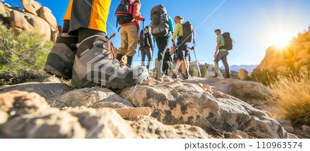 Hiker s shoes on mountain trail amidst scenic nature and people enjoying hiking experience. Hiker s shoes on mountain trail amidst scenic nature and people enjoying hiking experience. 110963574