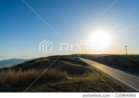 Aso Milk Road, a sightseeing spot that shines in the evening light, ``Aso Daikanbo area'' 110964860