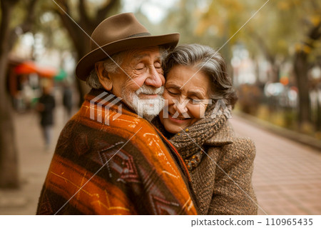 Cute elderly couple showing love to each other Cute elderly couple showing love to each other 110965435
