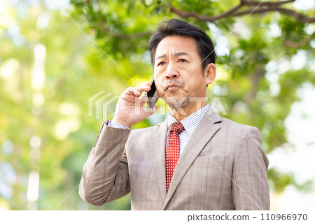 Businessman fresh green smartphone worried 110966970
