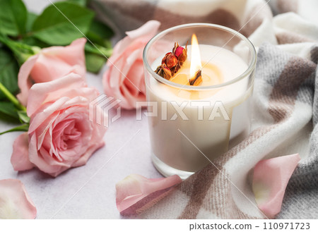 Aromatic candle on the table. Aromatic candle on the table. 110971723