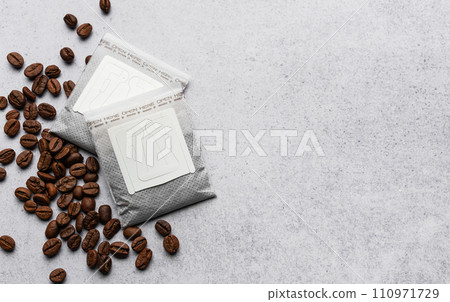 Drip coffee paper bags with coffee beans 110971729
