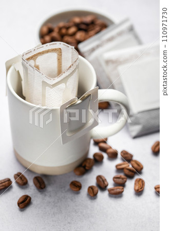 A  cup of freshly brewed drip coffee 110971730