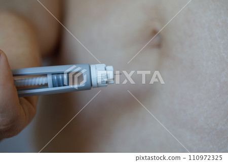 Diabetics and weight loss concept. Injection pen with Semaglutide or insulin cartridge pen  110972325