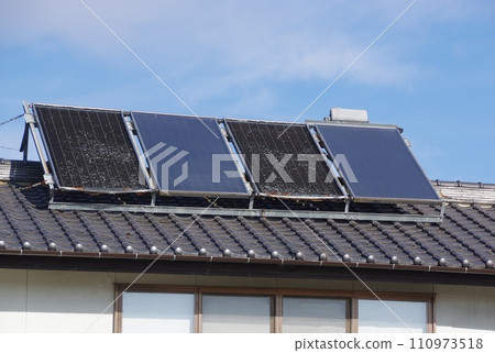 Solar water heater on the roof is deteriorating Solar water heater on the roof is deteriorating 110973518