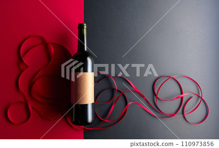 Bottle of red wine with old empty label. 110973856