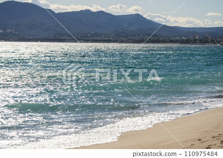 Sand beach of South France during spring with sea waves 110975484