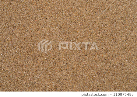 Texture of wet sand on a beach top view Texture of wet sand on a beach top view 110975493