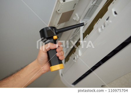 Dirty air conditioner filter need cleaning. Air conditioner service, repair and clean equipment. Dirty air conditioner filter need cleaning. Air conditioner service, repair and clean equipment. 110975704