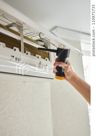 Dirty air conditioner filter need cleaning. Air conditioner service, repair and clean equipment. 110975735