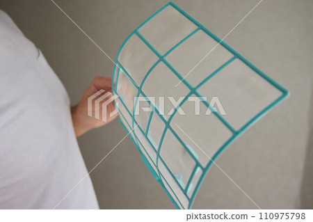 Dirty air conditioner filter need cleaning. Air conditioner service, repair and clean equipment. Dirty air conditioner filter need cleaning. Air conditioner service, repair and clean equipment. 110975798
