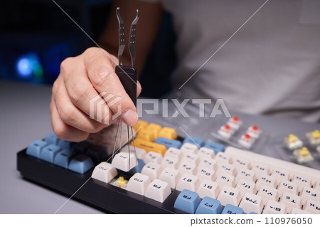 top view of keys and buttons circuit board of disassembled accounting calculator close up 110976050