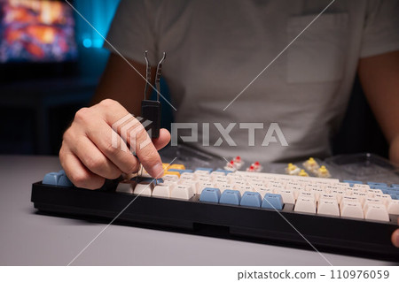 top view of keys and buttons circuit board of disassembled accounting calculator close up 110976059