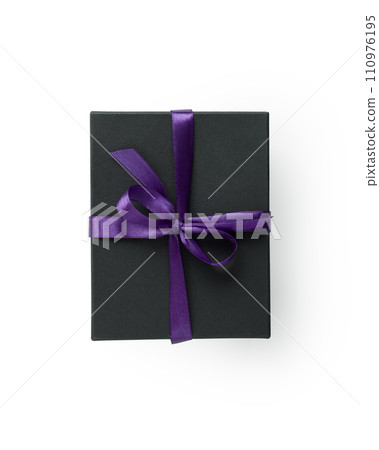 Top view of black gift box with violet ribbon isolated on white background Top view of black gift box with violet ribbon isolated on white background 110976195