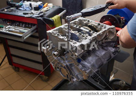 the engine ready to be reassembled on the car the engine ready to be reassembled on the car 110976355