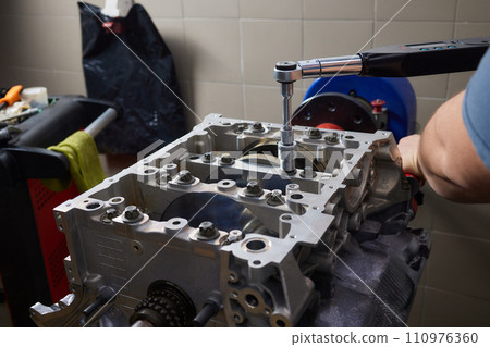 the engine ready to be reassembled on the car the engine ready to be reassembled on the car 110976360