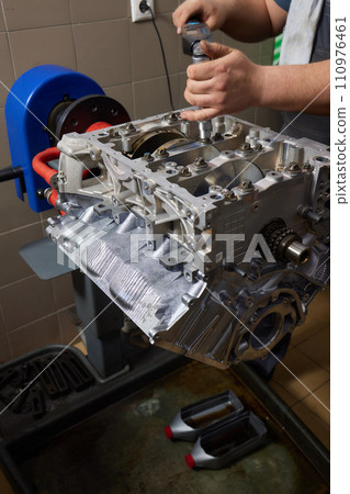 the engine ready to be reassembled on the car the engine ready to be reassembled on the car 110976461