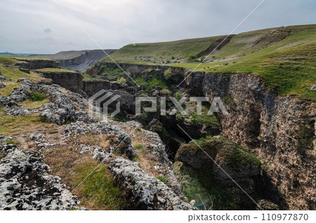 Landscape with valley with gorge of Aksu canyon in Kazakhstan in spring Landscape with valley with gorge of Aksu canyon in Kazakhstan in spring 110977870