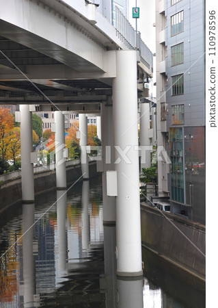 Nov 30 2023 Urban Skyline with Cityscape and Skyscrapers by the River 110978596
