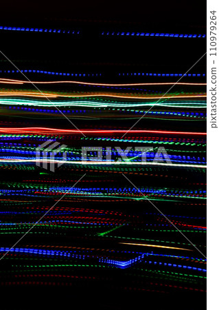 Abstract blurry background with pattern from colorful traces of lights 110979264