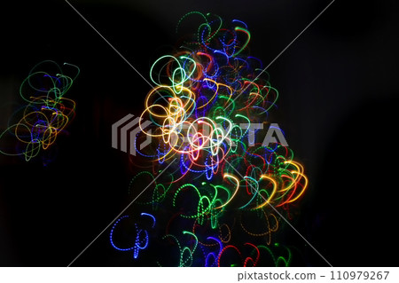 Abstract pattern from colorful traces of lights 110979267