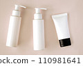 White bottles and tube of cosmetic products background 110981641